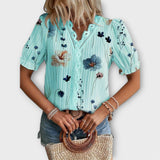 Paula - Elegante blusa con escote en pico