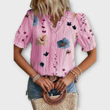 Paula - Elegante blusa con escote en pico