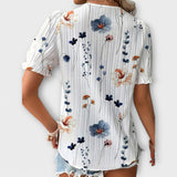 Paula - Elegante blusa con escote en pico