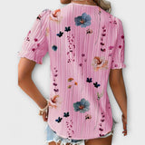 Paula - Elegante blusa con escote en pico